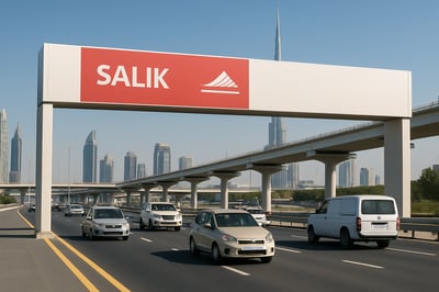 Dubai toll road with Salik gate and vehicles passing through